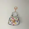 Nova bolsa de chaveiro em couro com padrão vintage, bolsa de armazenamento, estojo para fone de ouvido, porta-moedas, acessório fofo e compacto, mini pingente