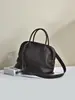 Bolso Nuevo Modelo 2026 con Forma de Concha Negra Hecho de Piel de Vaca de Primera Capa, Bolso de Mano y Bolso Cruzado, Bolso de Hombro Simple y Versátil para el Viaje Diario