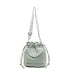 Nova Bolsa Balde de Lona Estilo Coreano 2025 Cor Sólida Elegante para Mulheres, Bolsa Transversal Simples Versátil para o Dia a Dia