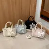 Bolso cubo acolchado de moda coreana para mujer 2026 nuevo bolso de mano elegante ins bolso de hombro cruzado versátil