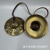 Colgante de campana antiguo de latón con ocho tesoros en la colección de instrumentos musicales tradicionales Xizang