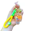 Llavero de Tortuga Luminosa Rellena de Aceite con Tortuga de Cristal Colgante de Arena Movediza Encanto de Regalo Pequeño Decoración para Bolso de Pareja Regalo