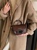 Bolso de silla de montar a cuadros de nicho para mujer 2023 nueva moda de otoño e invierno bandolera bandolera para el día a día