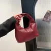 Bolso Tejido de Alta Gama Estilo Francés para Mujer, Nuevo Bolso Tipo Dumpling de Moda 2026, Bolso de Textura de Nicho para el Trabajo, Bolso de Mano Versátil
