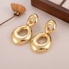 Pendientes de metal geométricos con lazo de amor transfronterizo, personalidad de alto sentido del estilo europeo y americano, pendientes exagerados con incrustaciones de circonita que no se decoloran