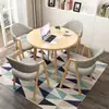 Conjunto de mesa e cadeiras para negociação loja comercial recepção reunião mesa redonda pequena área de descanso simples casual uma mesa quatro cadeiras mesa de jantar