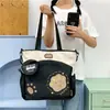 Bolso tote nuevo para estudiantes, gran capacidad, perfecto para sesiones de tutoría, diseño moderno color-blocking, patrón de dibujos animados lindo, gran capacidad, adecuado para ir al trabajo y llevar libros