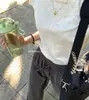 Han Yi Qi 2025 Ajuste Delgado Estilo Retro Americano Cuello Redondo Color Sólido Manga Corta Camiseta Casual Versátil
