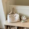 Bolsa de yoga ligera y transpirable para mujer, bolsa deportiva y de fitness de color sólido de moda de nicho, bolso de mano de gran capacidad, bolso cruzado de mano