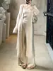 Otoño/Invierno 2026 Nuevo cárdigan largo de punto sin tirantes pantalones de pierna ancha de cintura alta conjunto de tres piezas de punto estilo perezoso con temperamento para mujer
