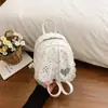 Mochila de coelho de orelhas caídas com poá transfronteiriça para mulheres 2026 nova fofa grande capacidade mochila escolar para meninas mochila versátil para o dia a dia