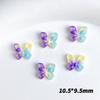 Popular en línea serie de mariposas huecas de colores mixtos accesorios para uñas luminosos viento de deseo puro degradado lazo accesorios para uñas