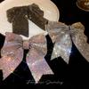 Horquilla con clip de resorte de lazo de diamantes completos superbrillantes Corea del Sur sentido del diseño dulce horquilla de clip superior nicho accesorios para el cabello de alta gama