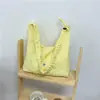 2026 Verano Nuevo Elegante Color Sólido Único Borde de Volantes Bolso de Hombro Gran Capacidad Moderno Bolso para el Trabajo y el Viaje
