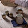 Juego de Té de Viaje traje Una Tetera Cuatro Tazas Portátil Taza de Té Kung Fu Exterior Simple Estilo Japonés Tetera Vintage Hogar