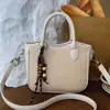 Bolsa feminina de nicho da moda estilo coreano transfronteiriça, nova bolsa transversal de moda outono 2026, bolsa de mão tipo balde texturizada