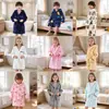 Bata de franela estampada para niños y niñas con capucha ropa de casa pijamas de otoño e invierno para niños toalla de baño cálida ropa para niños