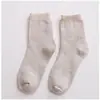 Calcetines de color liso para mujer, otoño e invierno, engrosados, de media pantorrilla, calcetines de rizo, para mujeres mayores, desodorantes, cálidos, calcetines de toalla para el suelo