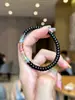 Pulsera de Cristal Blanco Natural Corte Recto para Hombres y Mujeres Pulsera de Pareja Pulsera de Pastilla de Ónix Negro Natural con Duobao Arcoíris