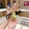 Llavero de Oro Puro 999 Creativo de Moda Colgante de Oro Bolso de Riqueza Diaria Bolsa de la Suerte Encanto Concha de Agua Mismo Estilo