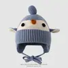 Touca de tricô super fofa em formato de pinguim para meninos, chapéu infantil à prova de vento para proteção das orelhas, outono e inverno, comércio exterior, chapéu de bebê fofo japonês e coreano