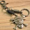 Llavero de piel de vaca estilo japonés y coreano, joyería punk vintage, colgante de llave de cabeza de fantasma, suministro a largo plazo
