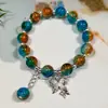Pulsera de Cristal Transfronteriza de 10 mm Flor de Ráfaga Soñadora para Mujer con Colgante de Mariposa de Color Degradado, Pulsera de Amistad de Diseño Único