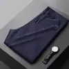Pantalones casuales de pana gruesa con forro de polar para otoño e invierno, pantalones rectos holgados a rayas para papás de mediana edad