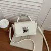 Bolsa de Trabalho de Luxo para Mulheres 2026 Nova Popular de Verão Exquisita Versátil de Mão Ombro Cruzado Pequena