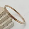 Pulseiras de Aço Inoxidável com Cravação de Diamantes Estilo Europeu e Americano para Casais, Homens e Mulheres, Pulseira Infinito Letra Z Zircônia