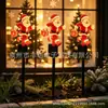 Nuevas luces solares de Navidad para decoración de ambiente, luces de suelo brillantes de Papá Noel, luces para césped de patio exterior
