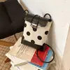 2026 Verano Nuevo Estilo Coreano Lunares Bloques de Color Diseño Simple Patchwork Personalizado Bolso Cubo de Hombro Único Bolso para Teléfono de Axila