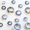 ASME/ANSI B18.21.1 Estándar Americano Arandela Redonda de Resorte para Junta Acero al Carbono Estampado Chapado en Zinc Azul Blanco suit