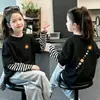Camiseta de manga larga para niña, colección primavera/otoño 2026, capa base de algodón puro, top elegante para bebés y niños mayores, diseño de imitación de dos piezas