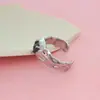 Anillo de acero de titanio chapado en oro, estilo frío europeo y americano Y2K, de lujo, ligero, con gema negra, personalizado, moderno, para celebridades de Internet.