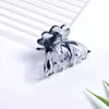 Pinza de sujeción para el pelo con forma de flor de calabaza mediana de 4.5CM Estampado de leopardo colorido Pinza superior avanzada Pinza de tiburón para el pelo Caliente transfronteriza Pinza de sujeción para el pelo