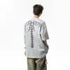 Camiseta de Verano de Diseño Nicho de Alta Gama para Hombre y Mujer, Manga Corta, Cuello Redondo Holgado, Espina Dorsal Recta de Pupila de Serpiente Americana