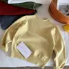 Nuevo suéter base de cuello alto medio para niños, jersey unisex, suéter cálido para bebés y niños pequeños, top de punto
