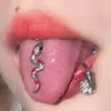 Unha de língua de aço inoxidável de cobra pequena gota de óleo ornamentos de língua personalizados atacado transfronteiriço punk unha de língua joia de piercing no corpo humano comércio exterior