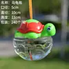 Barraca atacado QQ peixe garrafa barraca brinquedos pai-filho jogo adereços plástico pequeno tanque de peixes tartaruga garrafa QQ garrafa água-viva