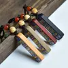 Sándalo verde marea nacional pintado todo va sobre ruedas para hombres y mujeres cadena de teléfono móvil colgante texto de madera borla de juego colgante de bolsa joyería