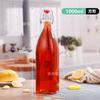 Venta al por mayor Bebida Enzimática de Jugo Botella de Vidrio para Licores Hebilla de Acero Inoxidable de Grado Alimenticio Sello Transparente Redonda Cuadrada