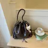 Shuai Mi Home Bolso Cubo de Moda Coreana con Cordón Simple 2026 Nuevo Nicho de Moda de Alto Valor Bolso de Hombro