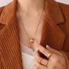 Colgante de doble capa con diseño de nicho femenino, con diseño de anillo frío dividido, de acero inoxidable, con nuevo temperamento francés, venta al por mayor para mujeres.