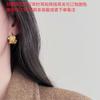 Pendientes de flor en forma de C con diseño de explosión de otoño e invierno 2024, sencillos, dorados y distintivos, elegantes y modernos para desplazamientos diarios.