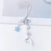 Moda transfronteriza Joker diseño simple colgante de planeta con purpurina llavero estuche para pendientes cadena para teléfono móvil cuerda colgante venta al por mayor