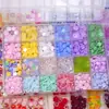 Paquete de 24 compartimentos de populares accesorios transfronterizos para decoración de uñas, piezas pequeñas de resina, pinzas para el cabello, pendientes, accesorios para uñas postizas, diamantes de imitación de fondo redondo al por mayor