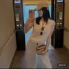 Colete de Tricô sem Mangas com Recortes Estilo Francês, Slim-Fit, na Cor Damasco, com Calça de Cintura Alta e Barra Larga