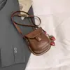 Bolso de Nicho de Gama Alta para Mujer Otoño e Invierno 2025 Nuevo Bolso Retro de Hombro Cruzado Popular Ins Bolso Mini tipo Silla de Montar