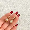 Pendientes de Diseño de Nicho de Lujo Ligero Estilo Francés Pendientes Dulces y Frescos Moda Simple Puños de Oreja de Perla de Gama Alta